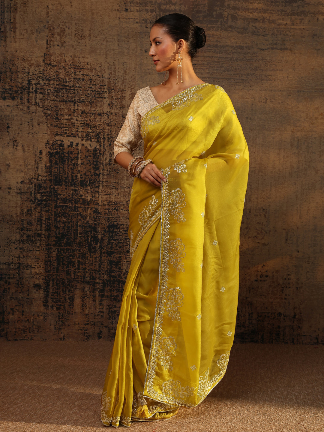 Mustard Ethnic Motifs Embellished Tissue Saree With Unstitched Blouse Piece