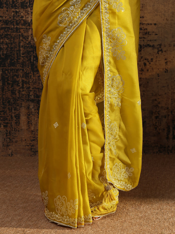 Mustard Ethnic Motifs Embellished Tissue Saree With Unstitched Blouse Piece