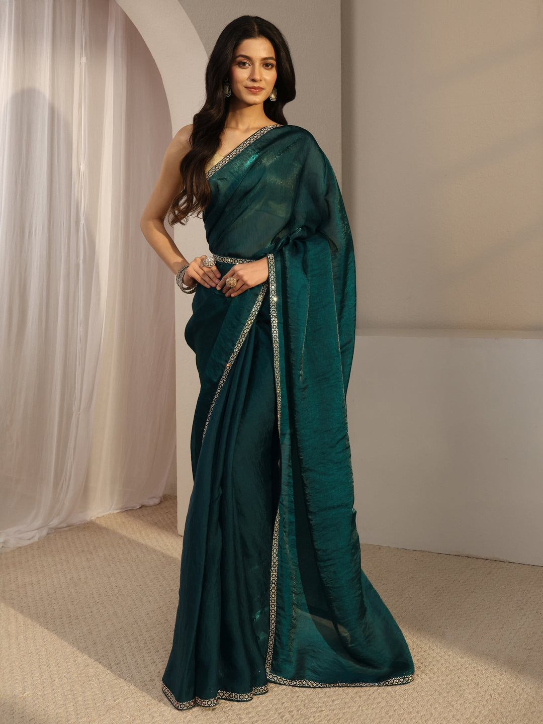 Teal Embellished Satin Saree With Unstiched Blouse Piece