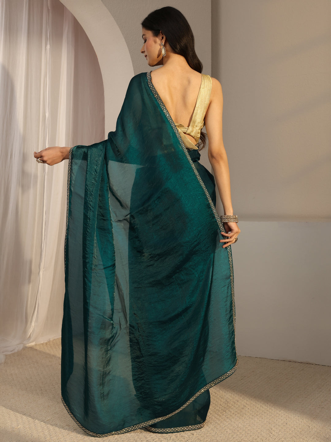 Teal Embellished Satin Saree With Unstiched Blouse Piece