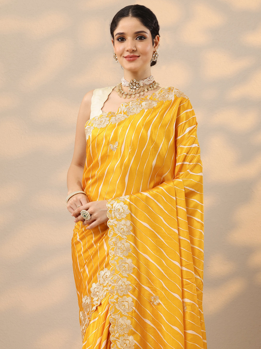 Mustard Leheriya Printed Chinon Saree With Unstitched Blouse Piece