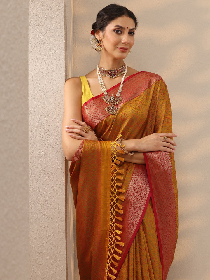 Mustard Woven Design Banarasi Silk Blend Saree With Unstitched Blouse Piece