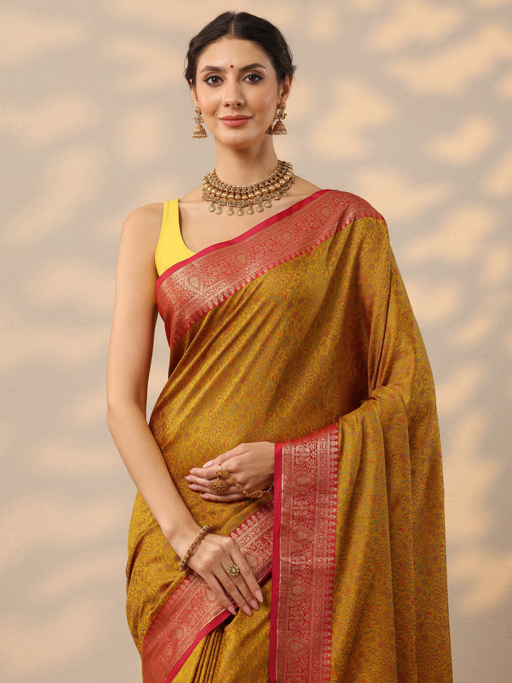 Mustard Woven Design Banarasi Silk Blend Saree With Unstitched Blouse Piece