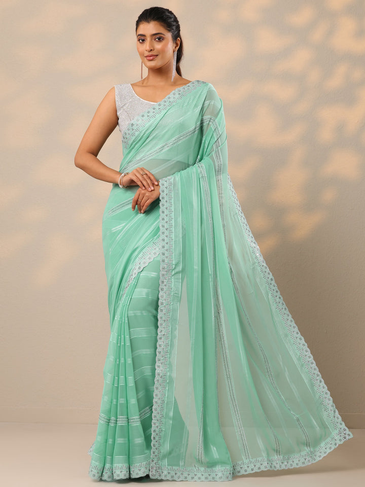 Blue Embellished Georgette Sarees With Unstitched Blouse Piece