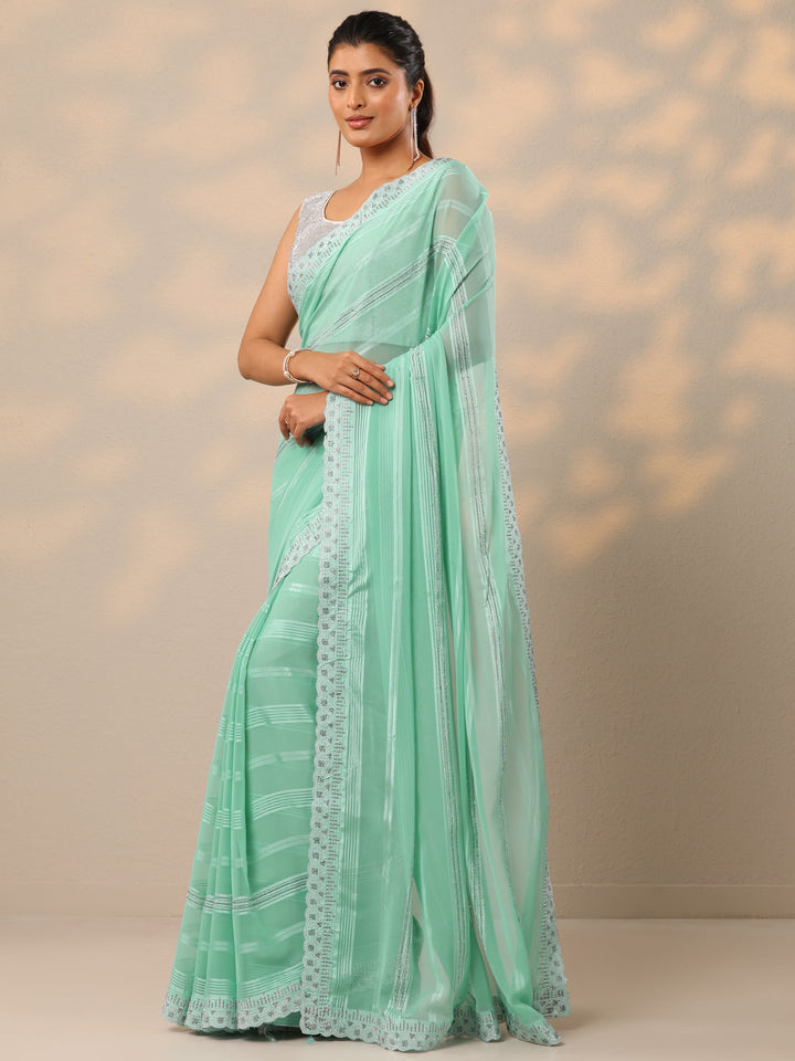 Blue Embellished Georgette Sarees With Unstitched Blouse Piece