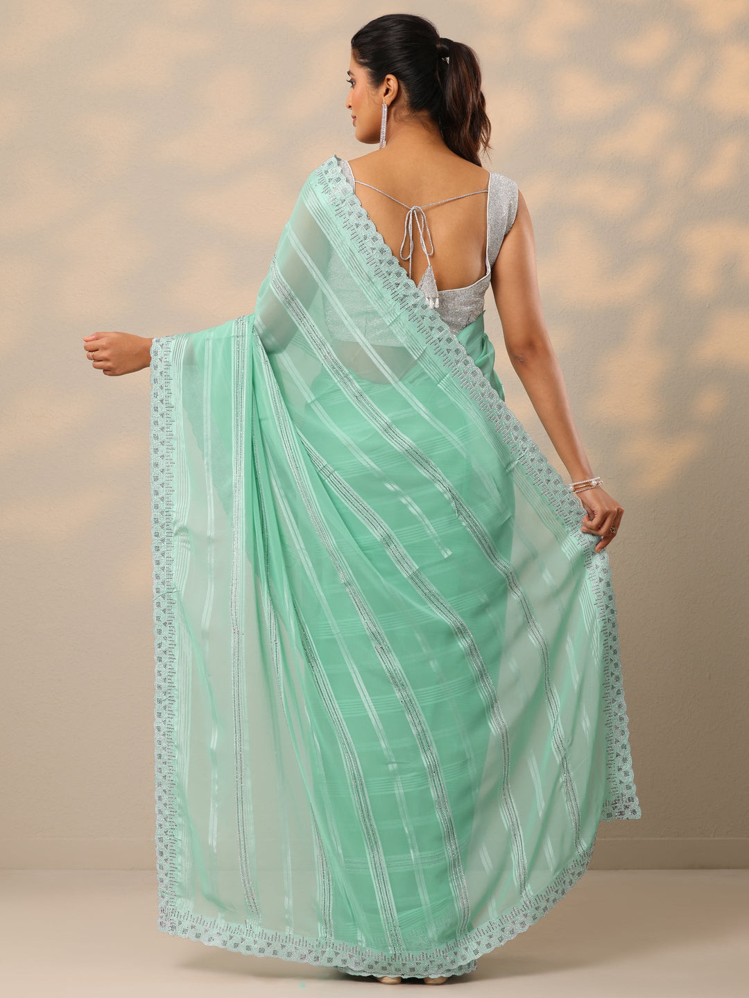 Blue Embellished Georgette Sarees With Unstitched Blouse Piece