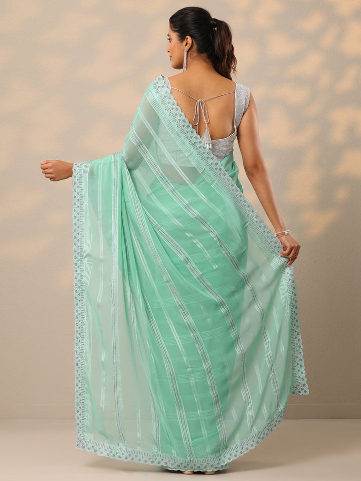 Blue Embellished Georgette Sarees With Unstitched Blouse Piece