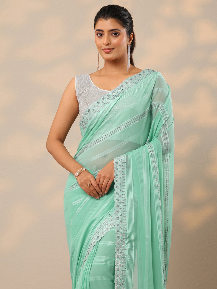 Blue Embellished Georgette Sarees With Unstitched Blouse Piece