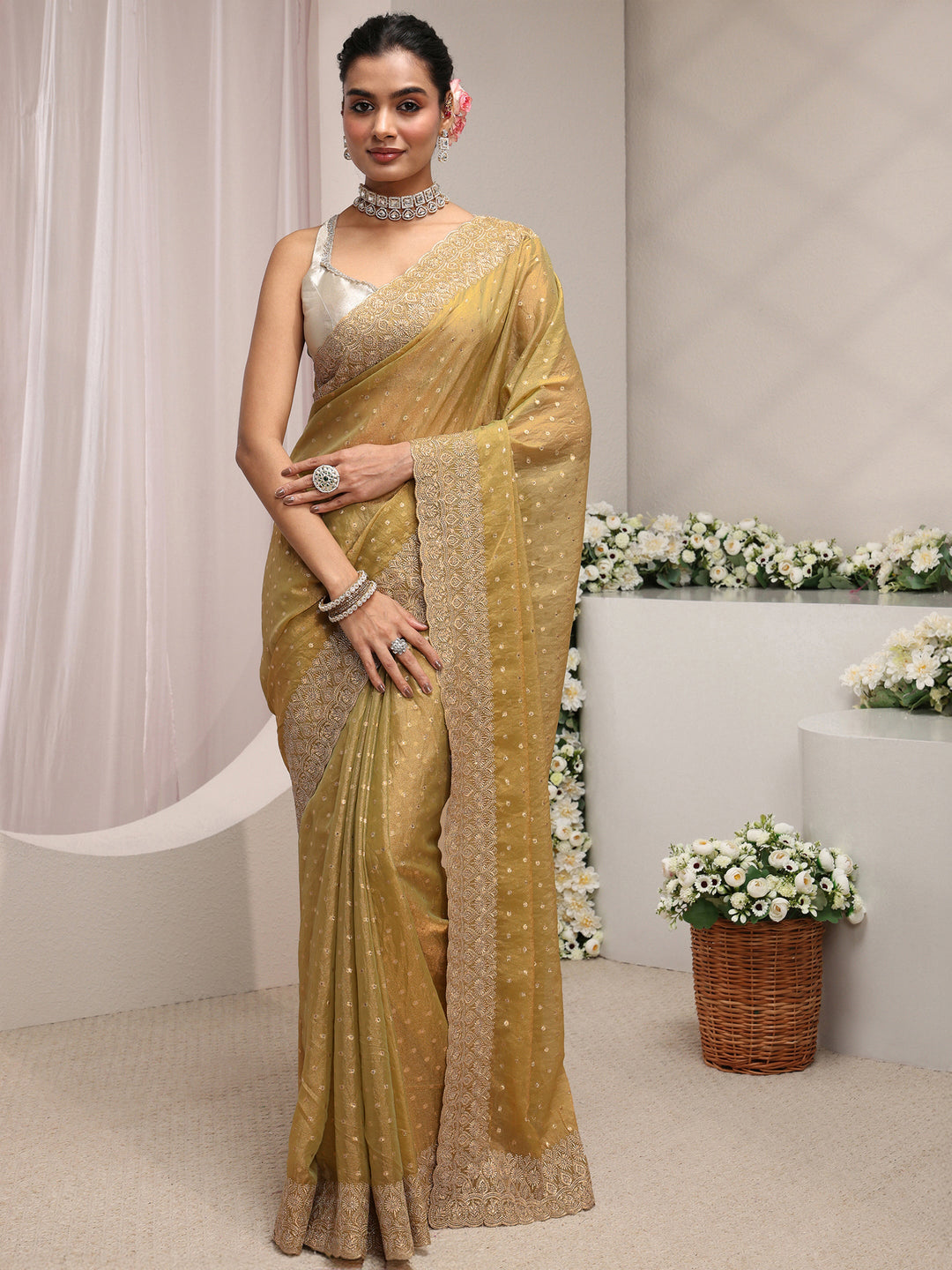 Green Woven Design Tissue Saree With Unstitched Blouse Piece