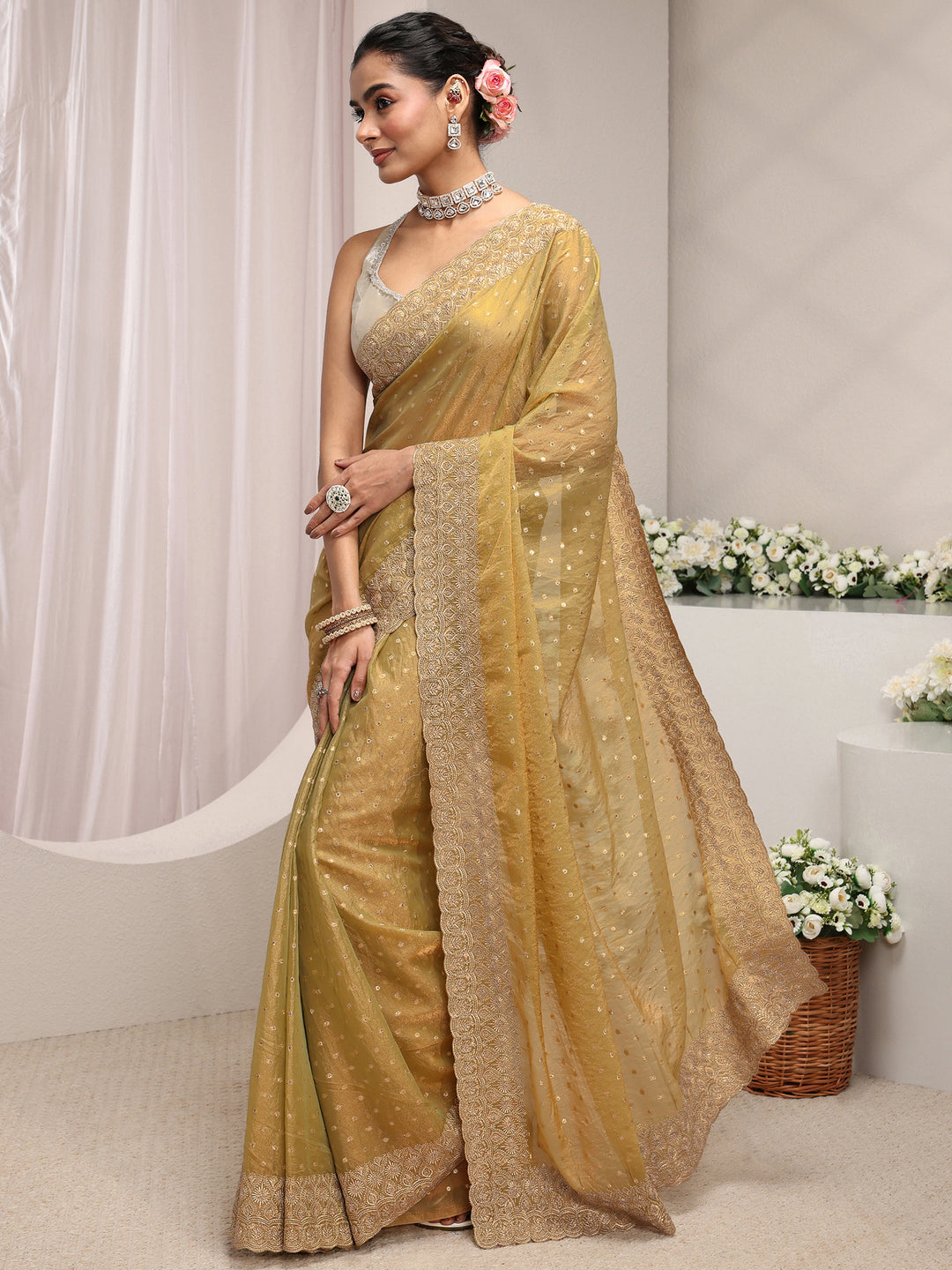 Green Woven Design Tissue Saree With Unstitched Blouse Piece