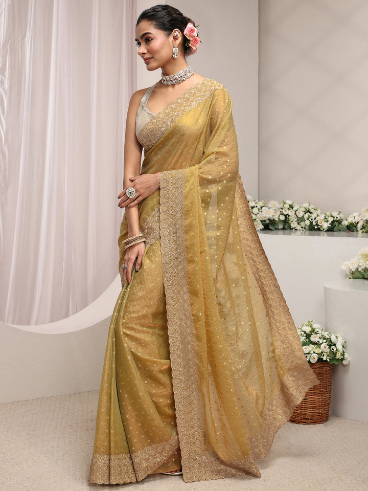 Green Woven Design Tissue Saree With Unstitched Blouse Piece