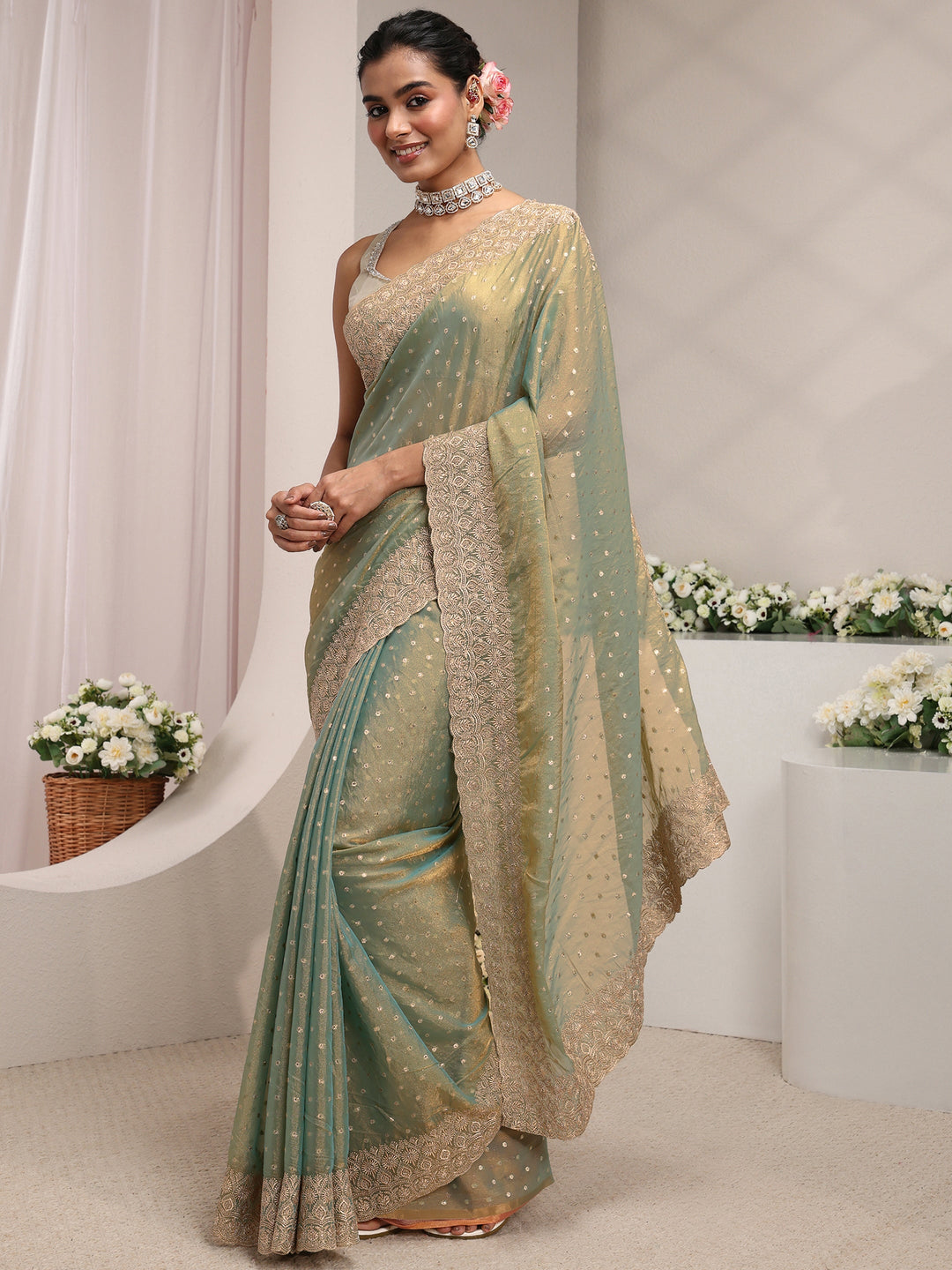 Green Woven Design Tissue Saree With Unstitched Blouse Piece