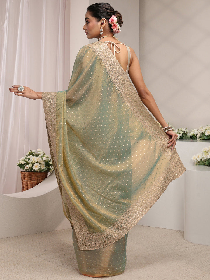 Green Woven Design Tissue Saree With Unstitched Blouse Piece