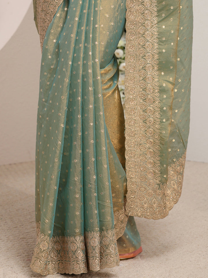 Green Woven Design Tissue Saree With Unstitched Blouse Piece