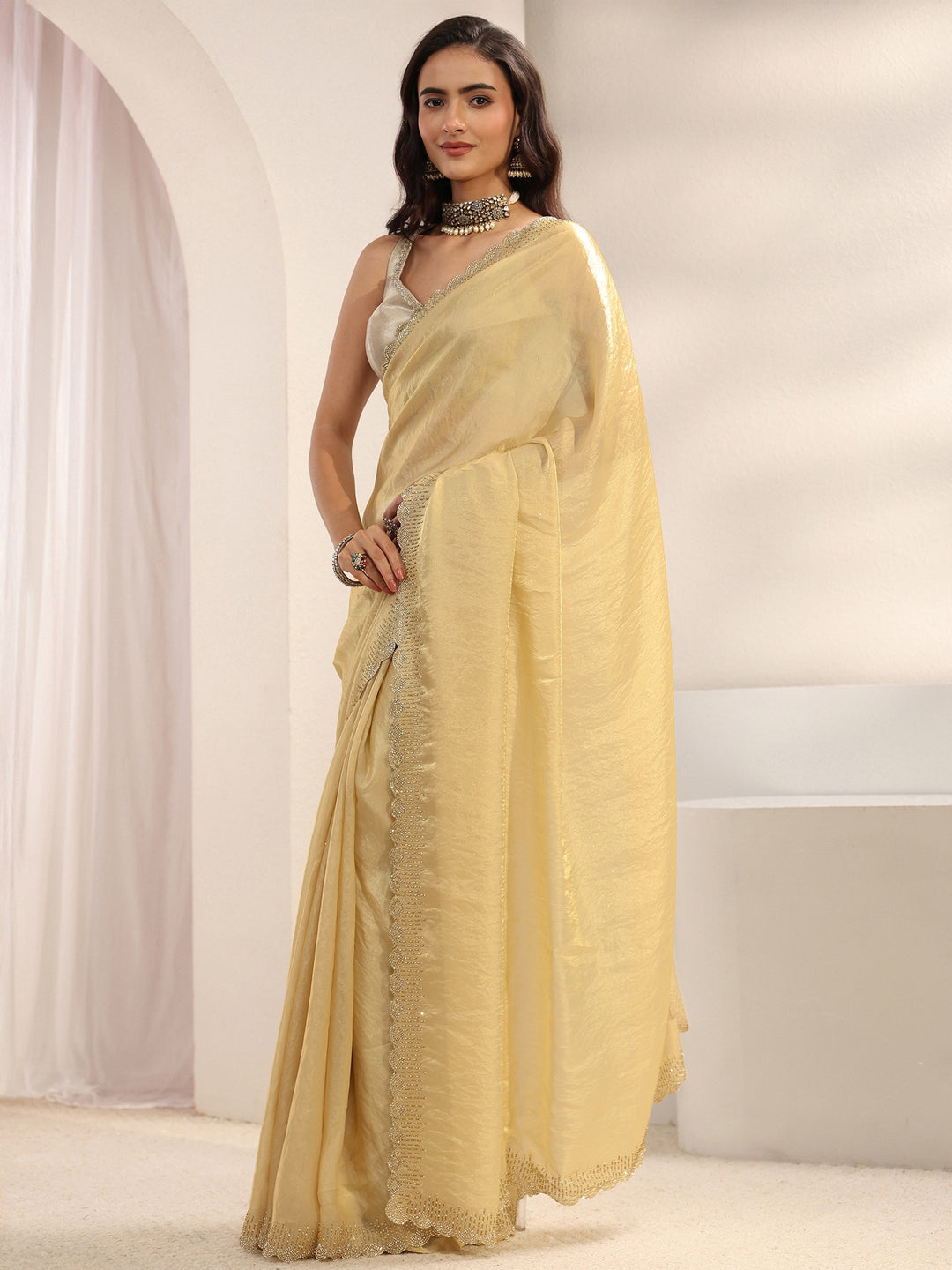Beige Embellished Border Tissue Saree With Unstitched Blouse Piece