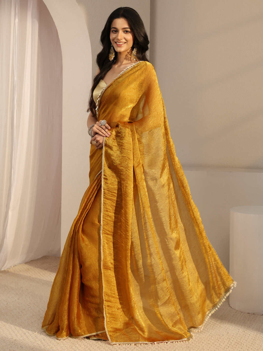 Mustard Solid Tissue Saree With Unstiched Blouse Piece