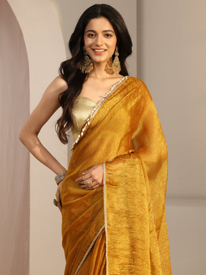 Mustard Solid Tissue Saree With Unstiched Blouse Piece