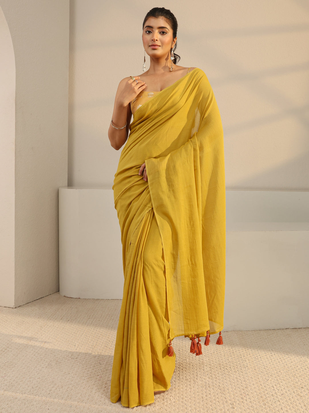 Mustard Solid Cotton Tassel Saree With Unstitched Blouse Piece