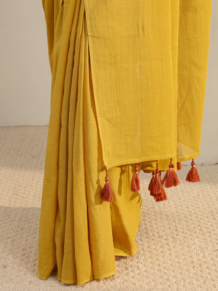 Mustard Solid Cotton Tassel Saree With Unstitched Blouse Piece