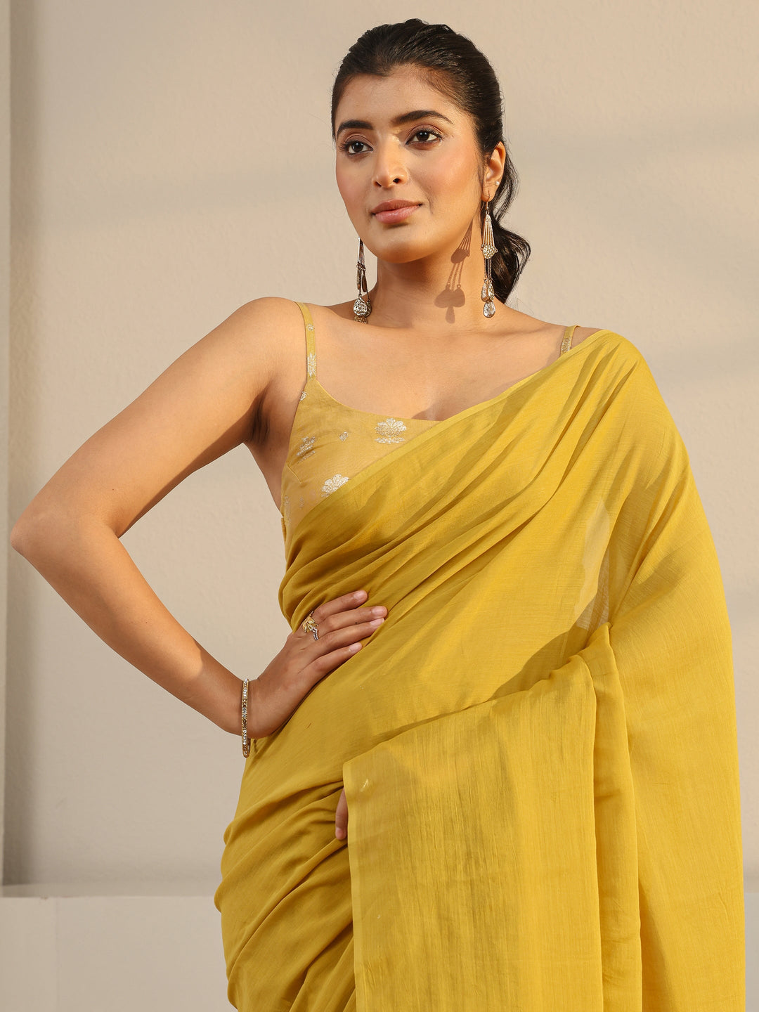 Mustard Solid Cotton Tassel Saree With Unstitched Blouse Piece