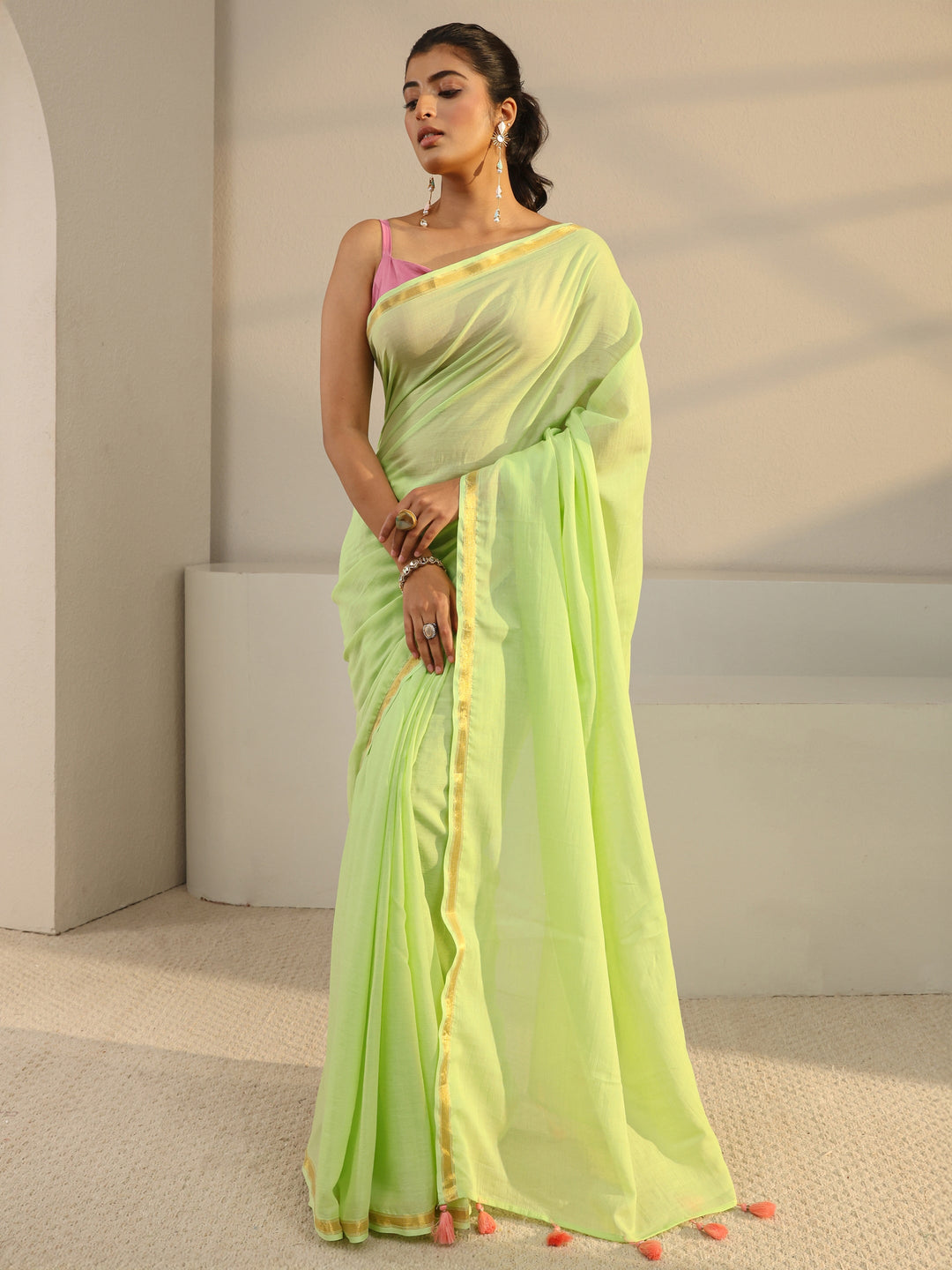 Green Solid Cotton Tassel Saree With Unstitched Blouse Piece