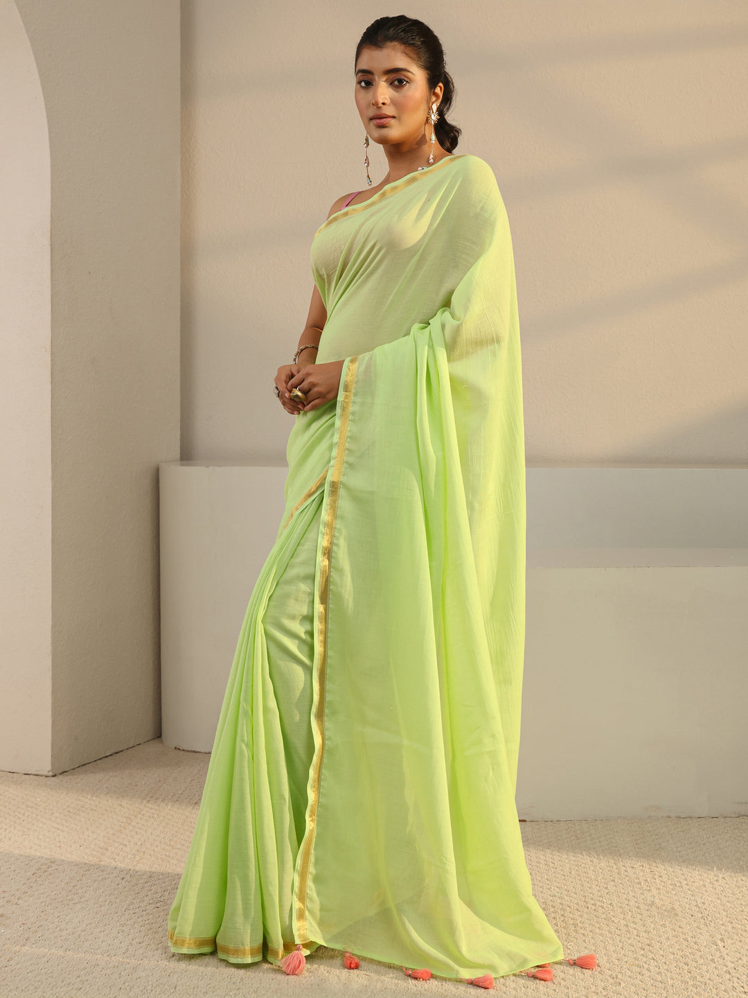 Green Solid Cotton Tassel Saree With Unstitched Blouse Piece