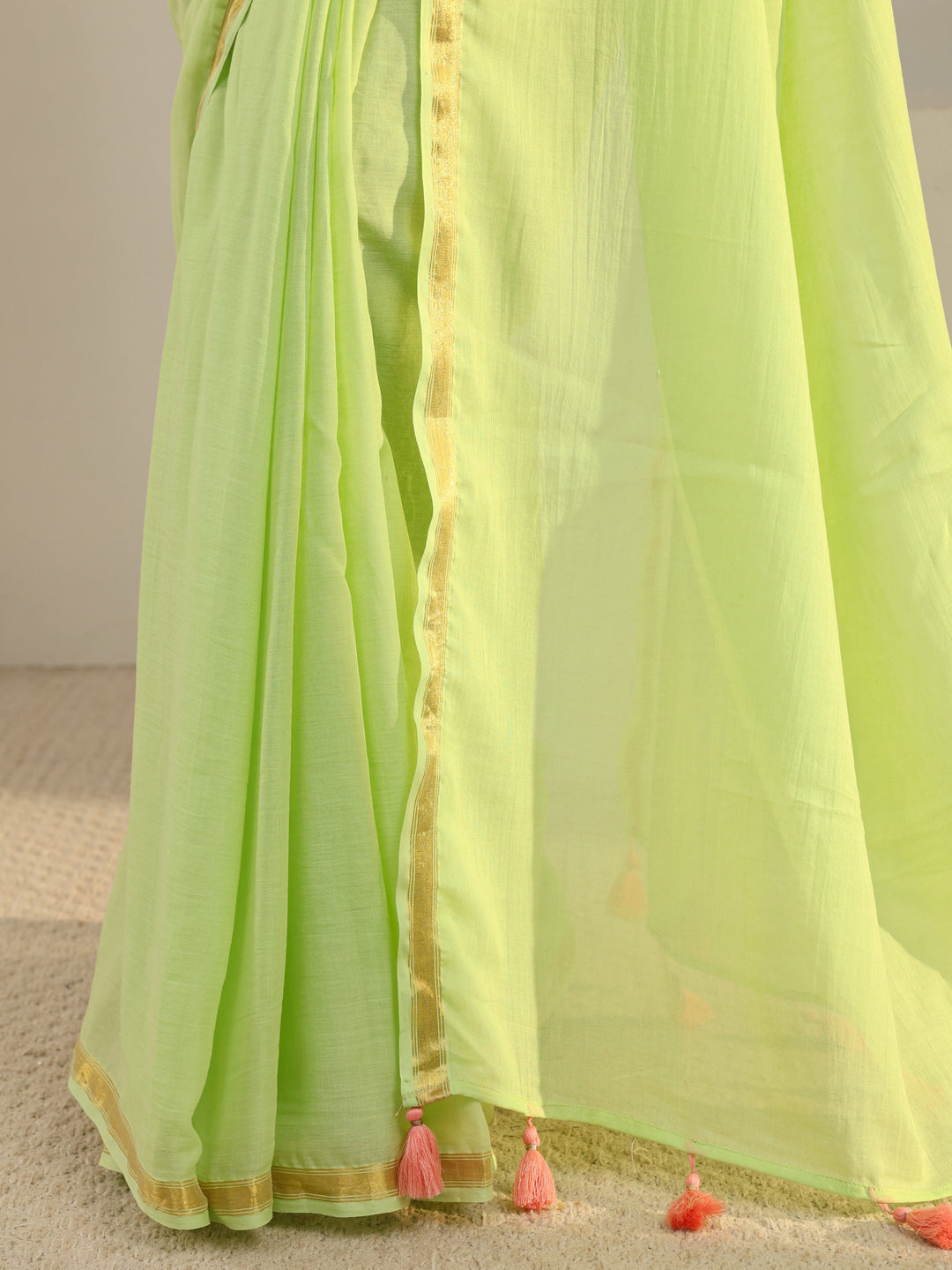 Green Solid Cotton Tassel Saree With Unstitched Blouse Piece