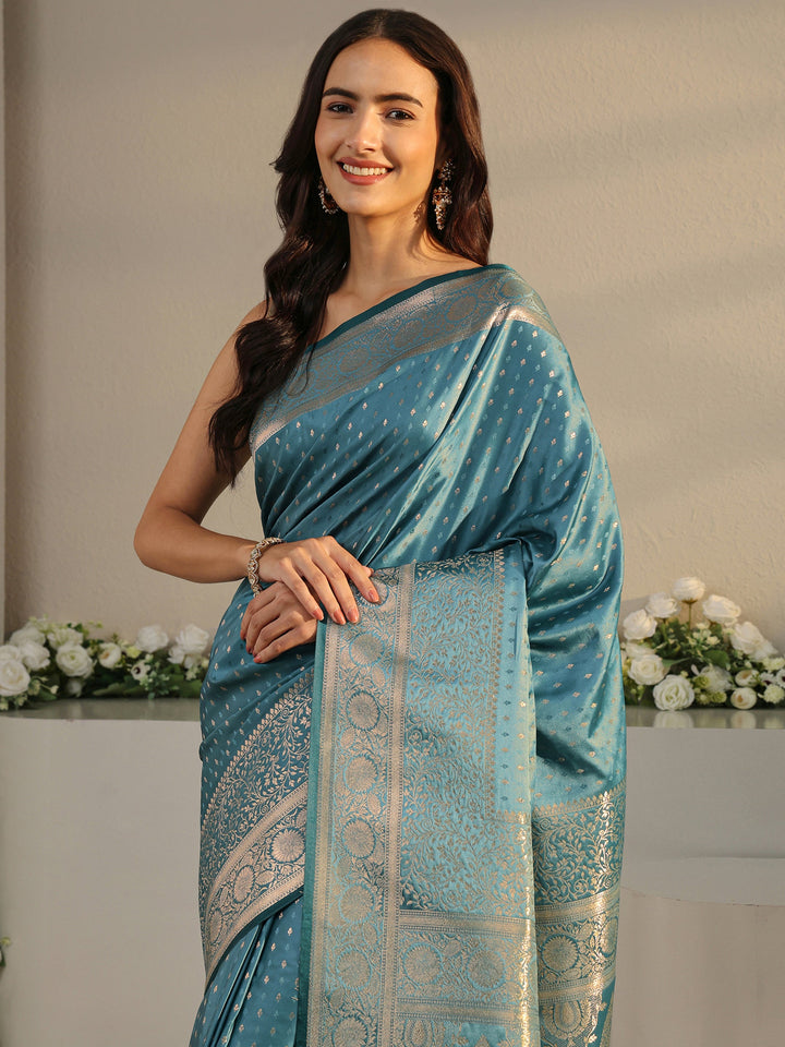 Teal Ethnic Woven Design Silk Blend Saree With Unstitched Blouse Piece