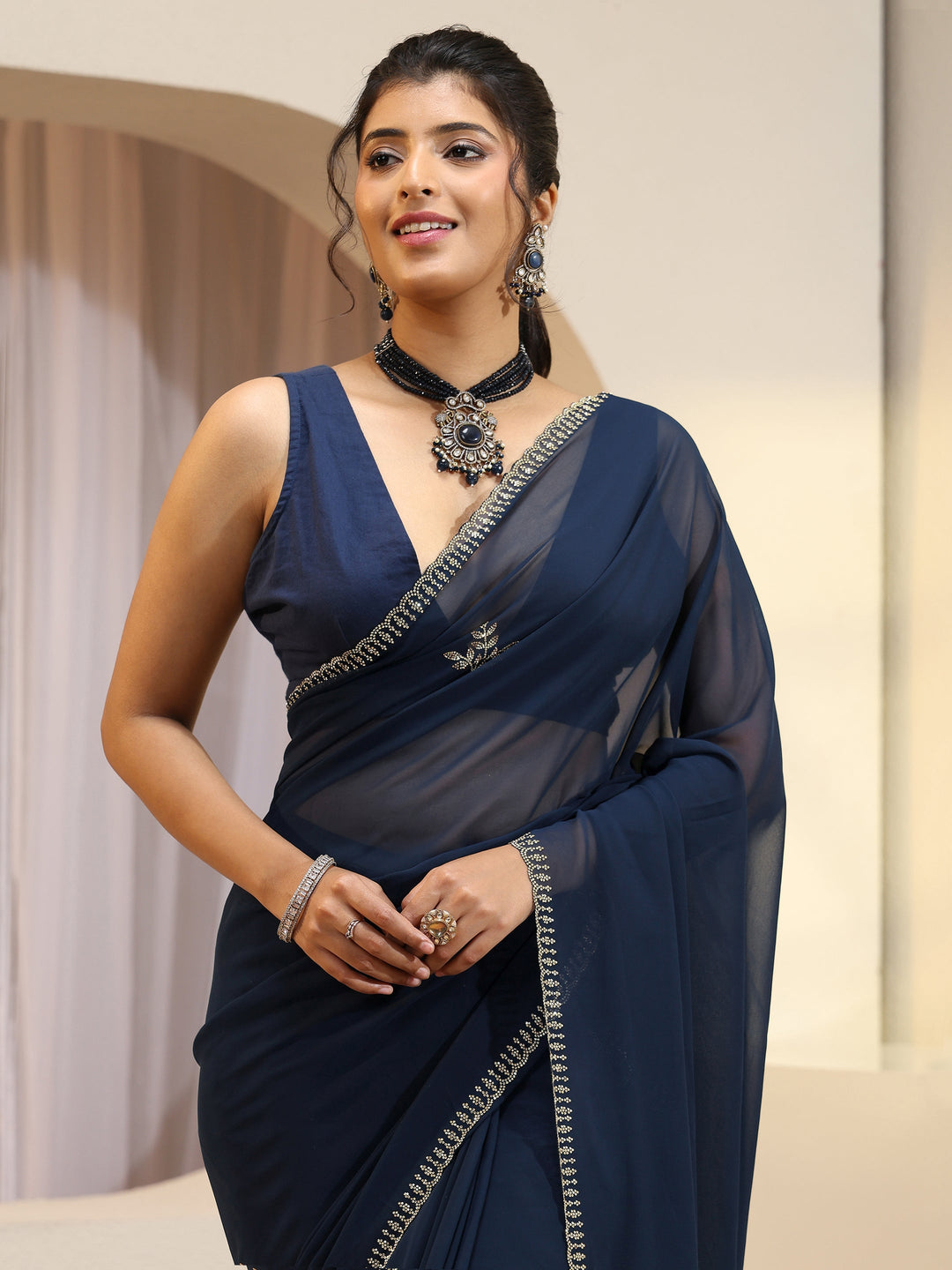 Navy Georgette Saree With Floral Embellished Pallu