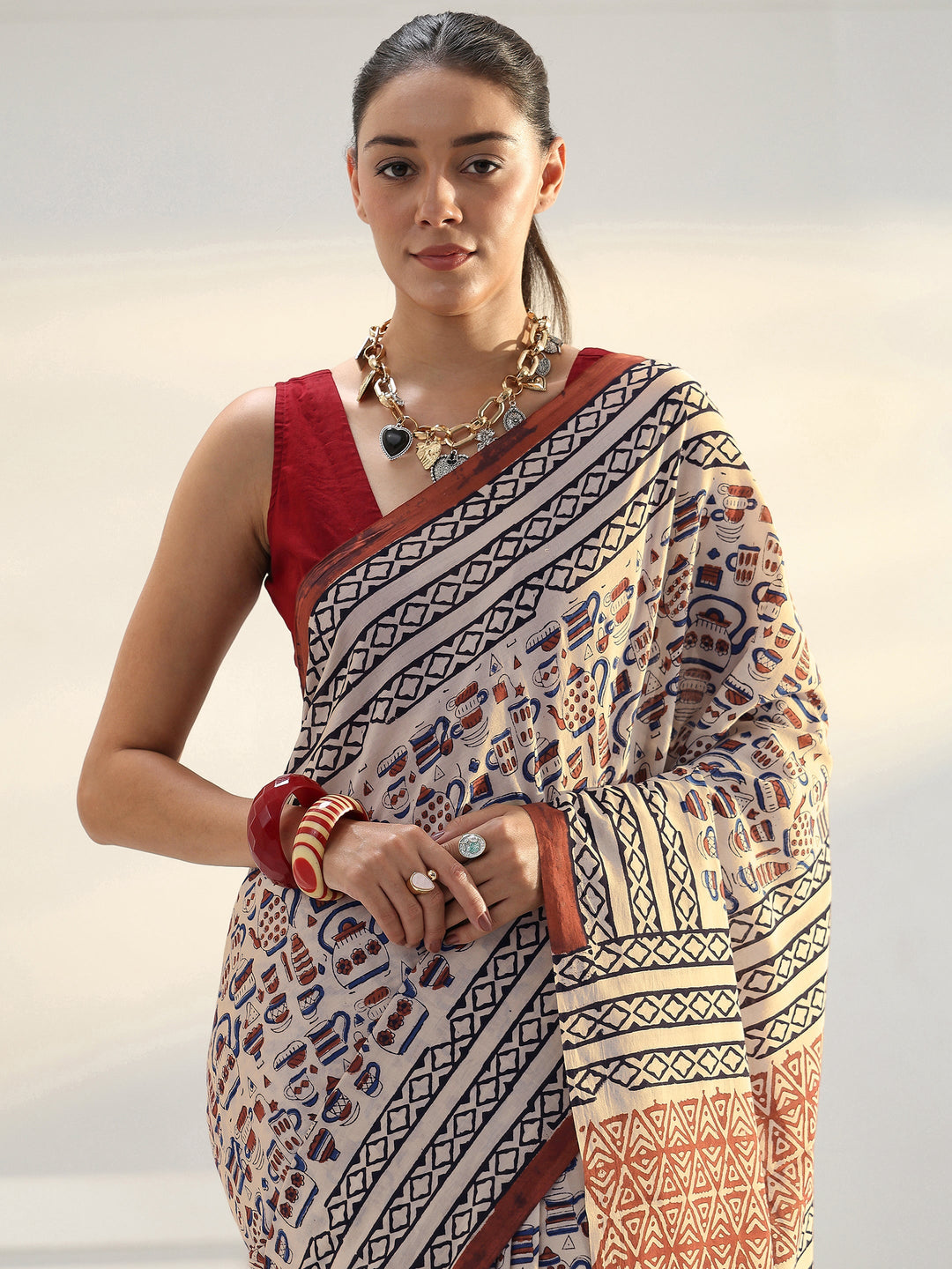 Beige Quirky Printed Cotton Saree