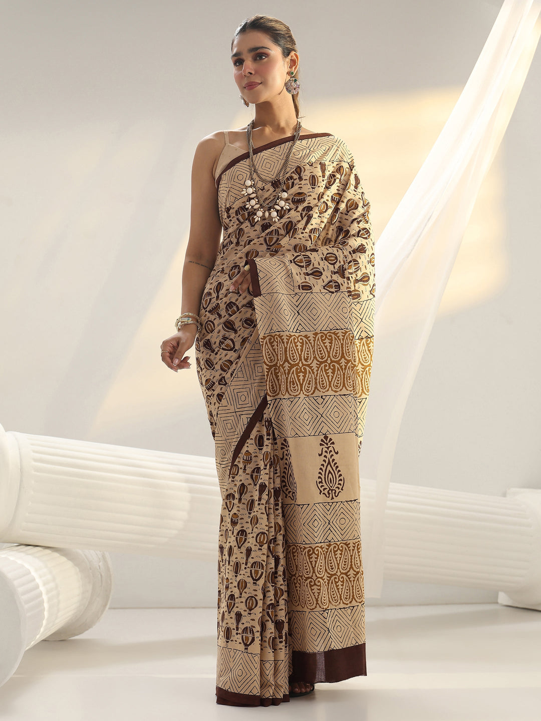 Beige Quirky Printed Cotton Saree