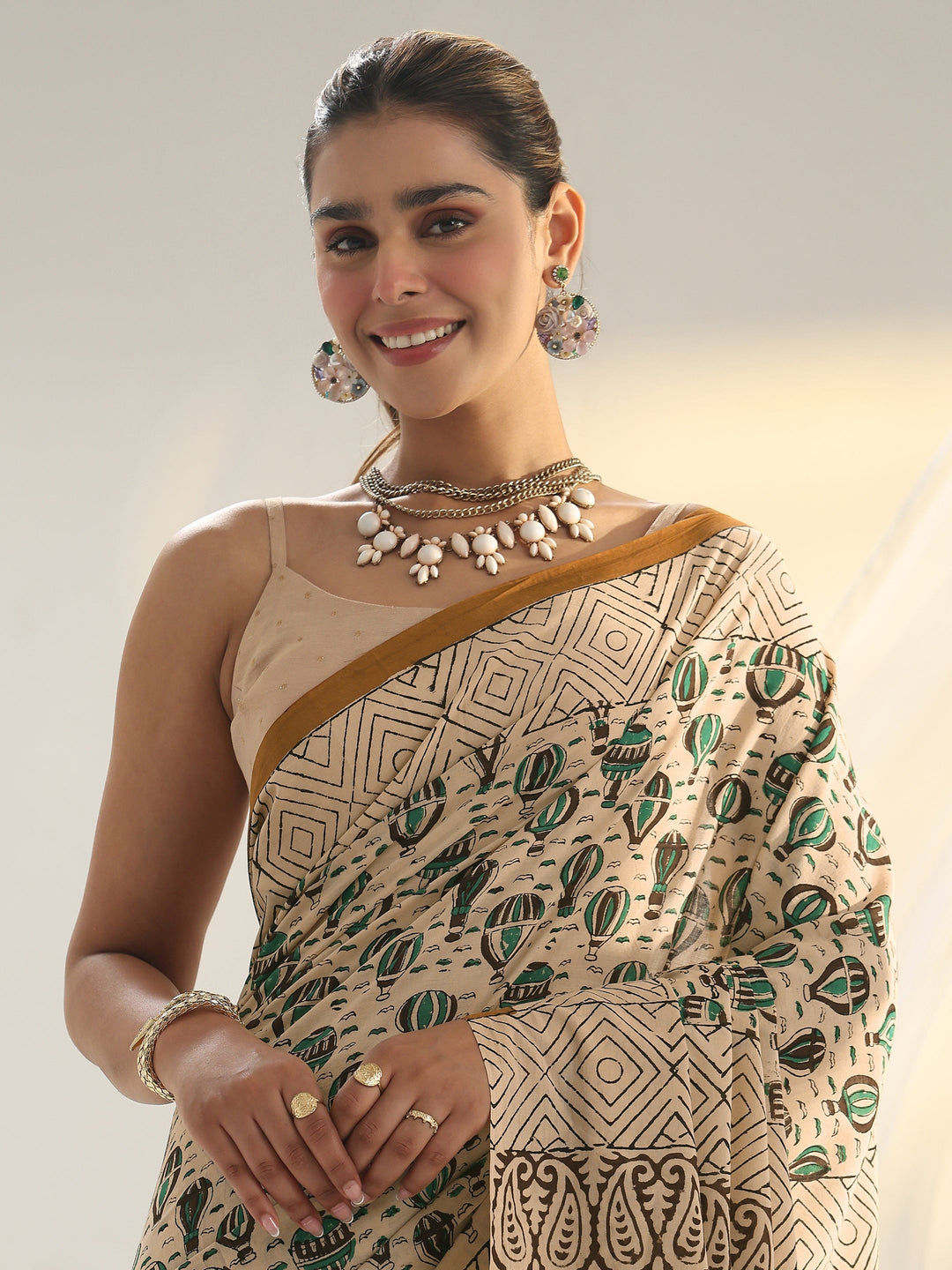 Beige Quirky Printed Cotton Saree