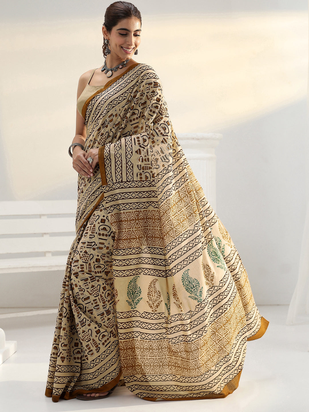 Beige Quirky Printed Cotton Saree