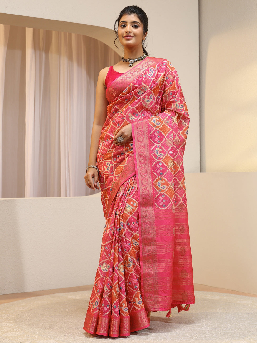 Coral Pink Ethnic Print Silk Blend Patola Saree