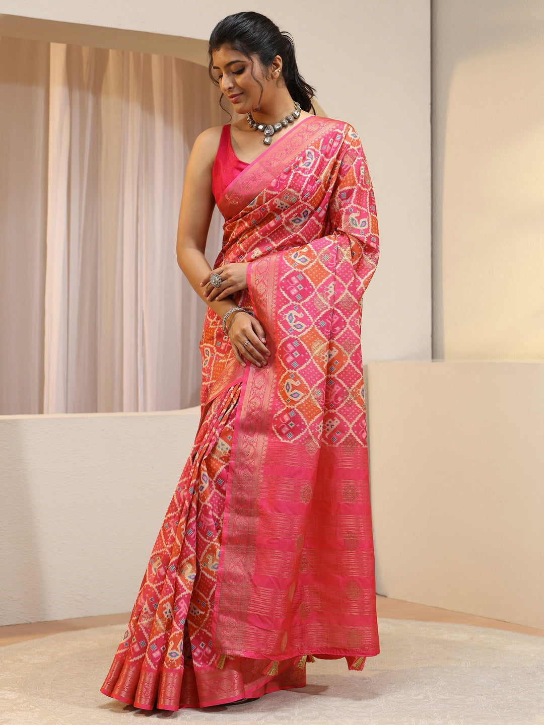 Coral Pink Ethnic Print Silk Blend Patola Saree