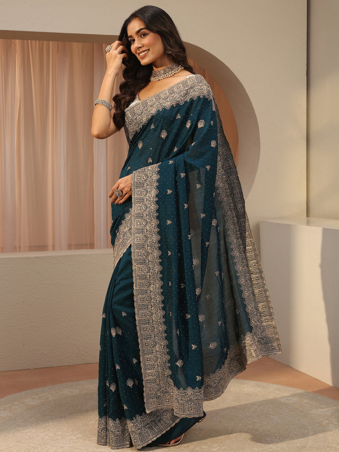 Teal Tissue Saree With Embellished Border