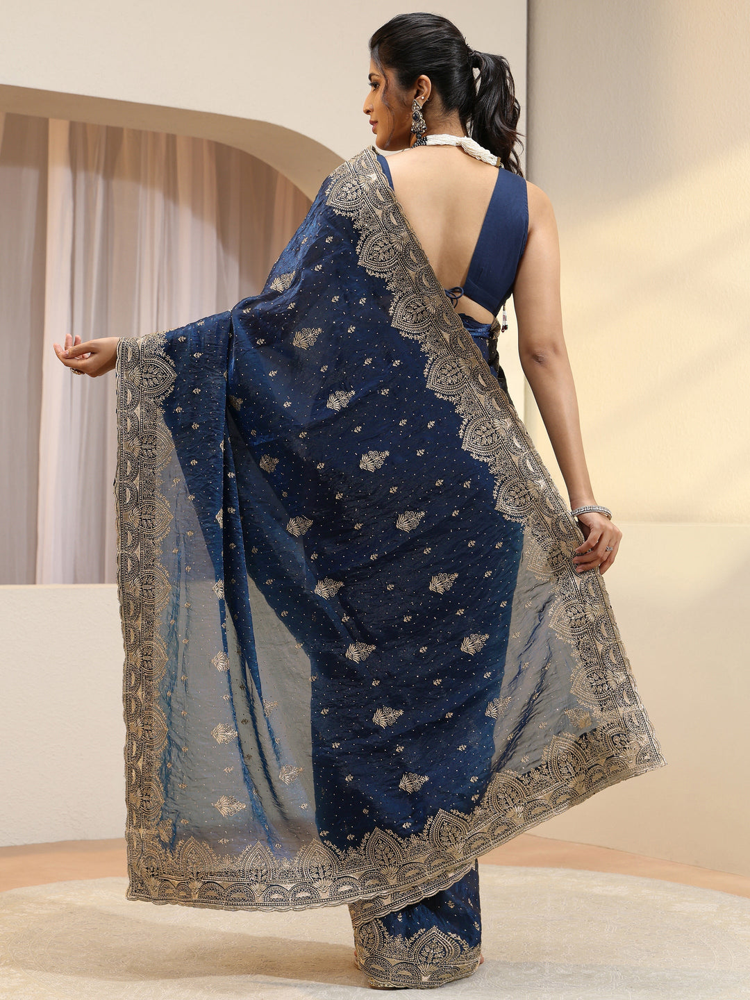 Peacock Blue Tissue Saree With Embellished Border