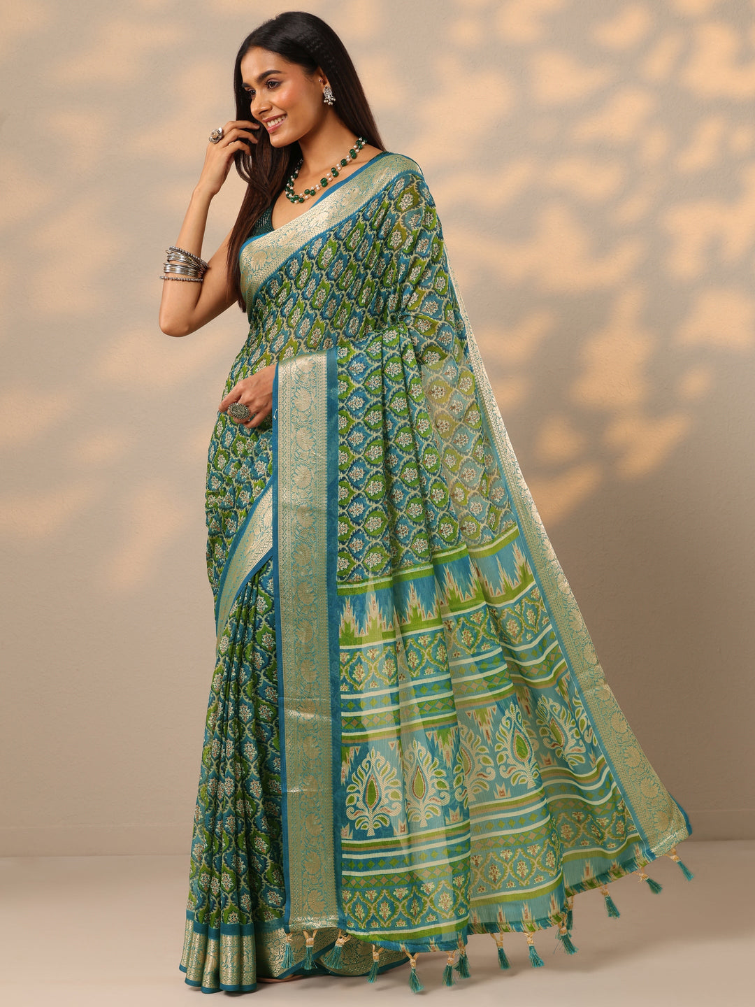 Teal Printed Georgette Saree With Unstitched Blouse Piece