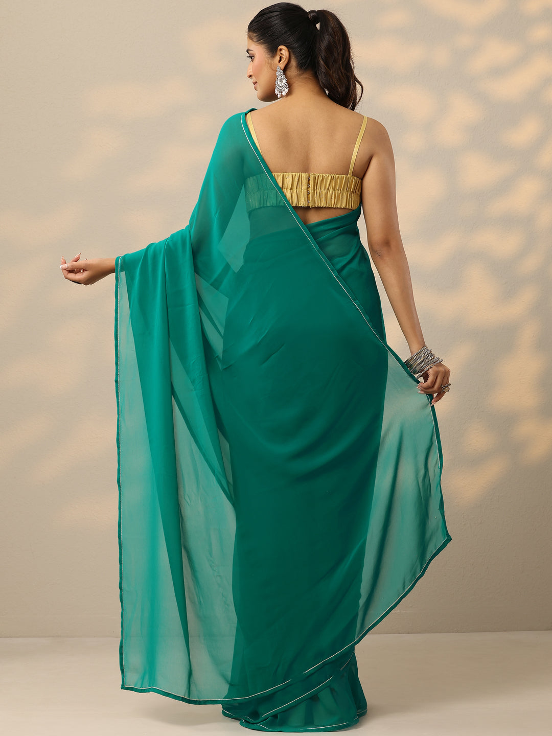 Green Solid Georgette Saree With Unstitched Blouse Piece