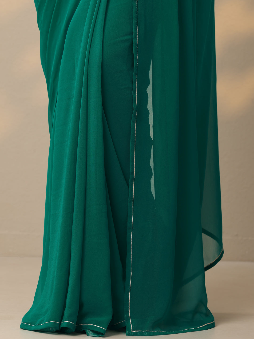 Green Solid Georgette Saree With Unstitched Blouse Piece