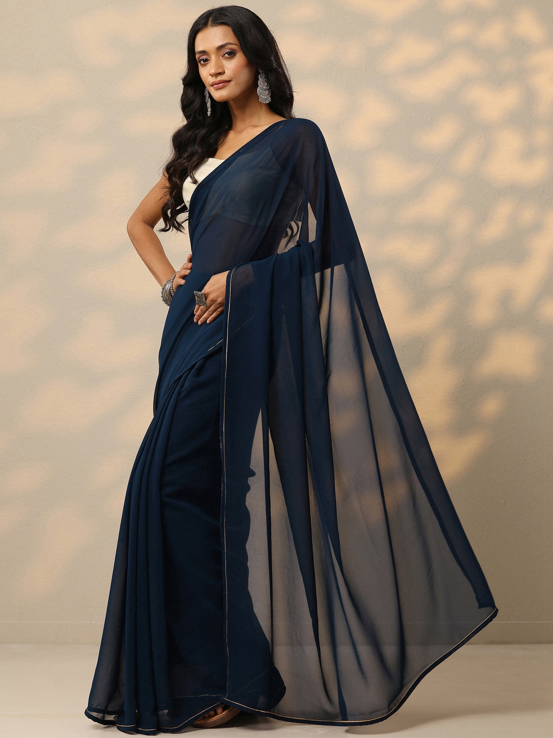 Blue Solid Georgette Saree With Unstitched Blouse Piece