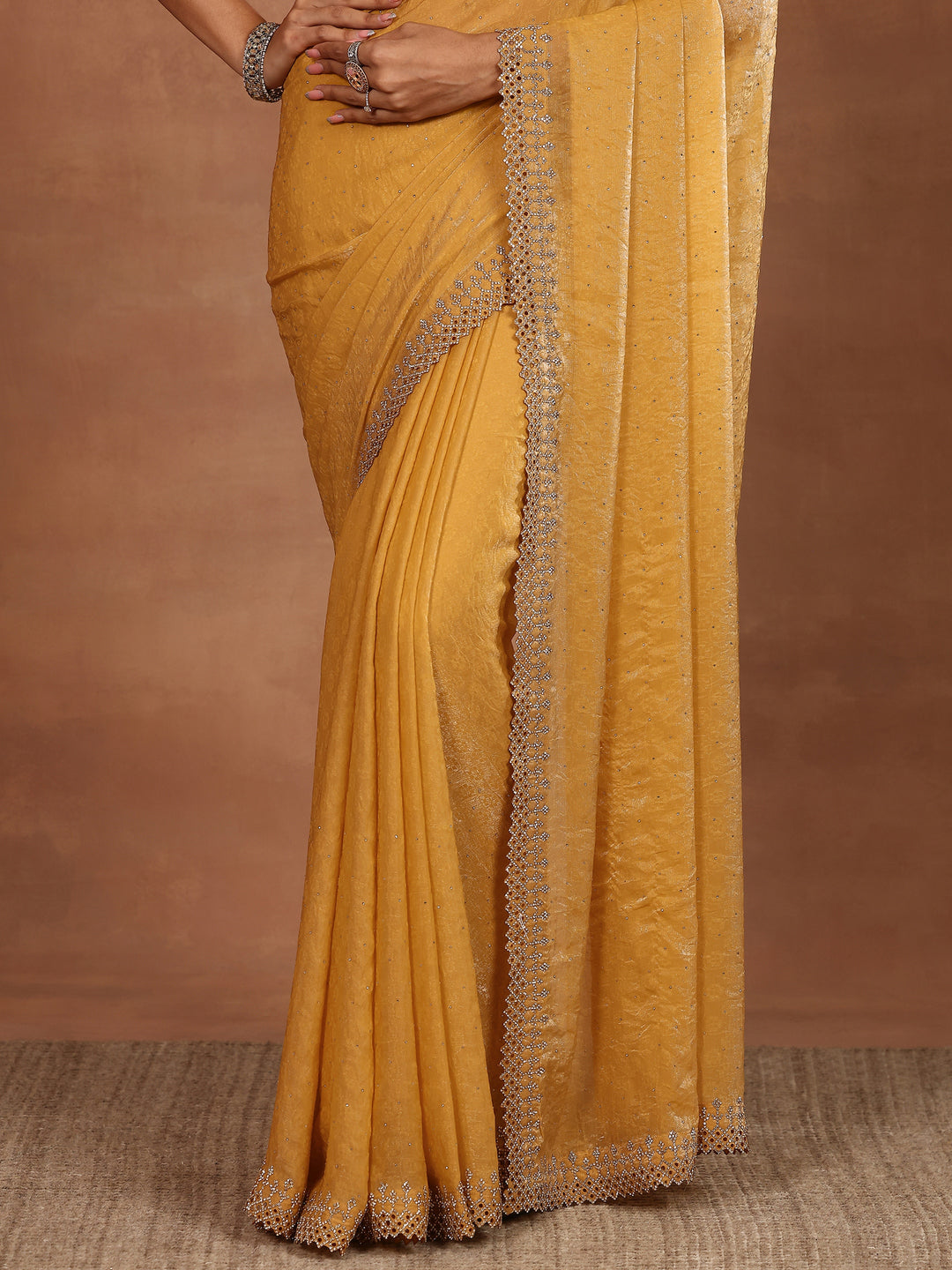 Mustard Embellished Chiffon Sarees With Unstitched Blouse Piece