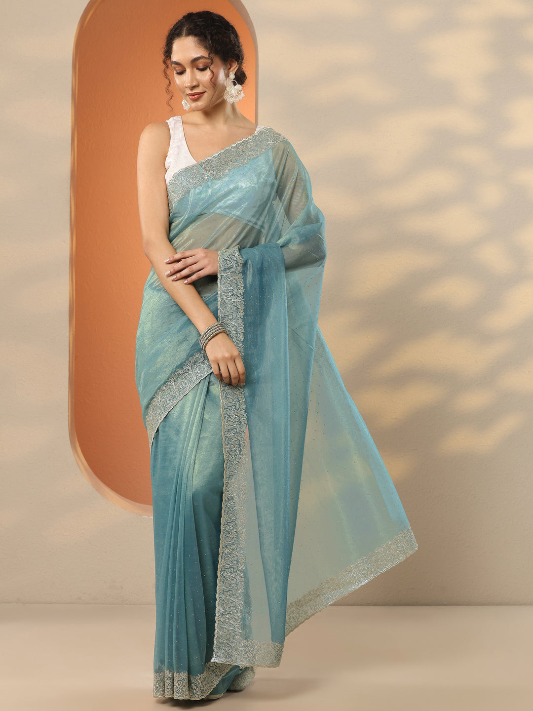 Sea Green Embellished Nylon Saree With Unstitched Blouse Piece