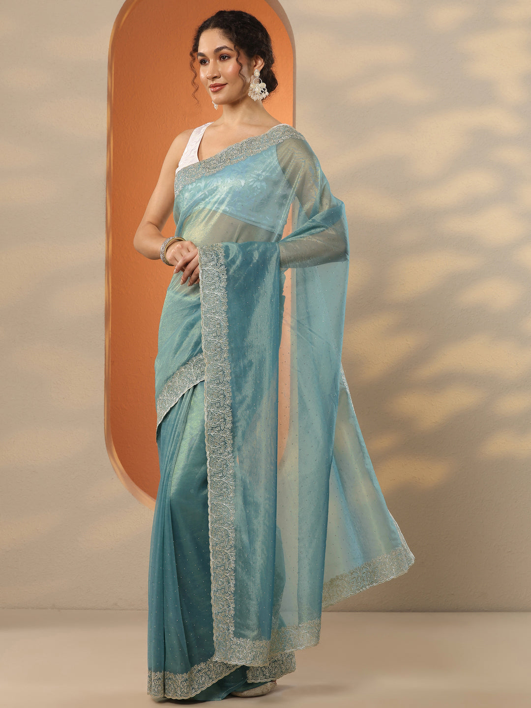 Sea Green Embellished Nylon Saree With Unstitched Blouse Piece