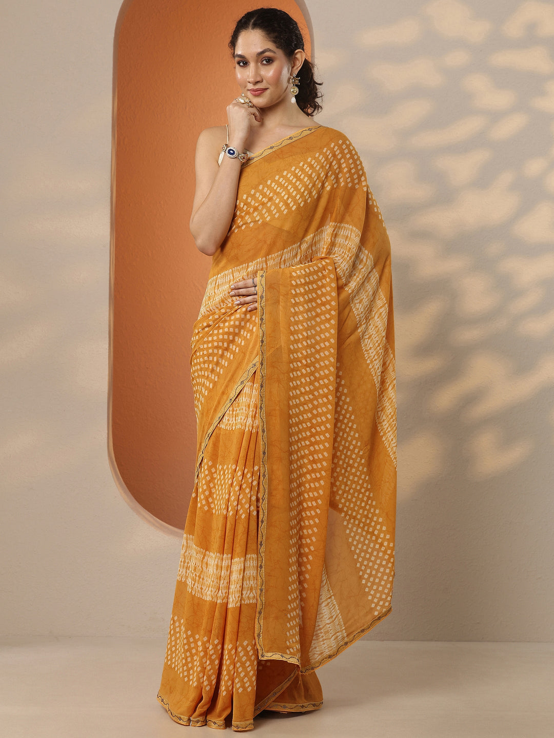 Mustard Bandhani Printed Georgette Saree With Unstitched Blouse Piece