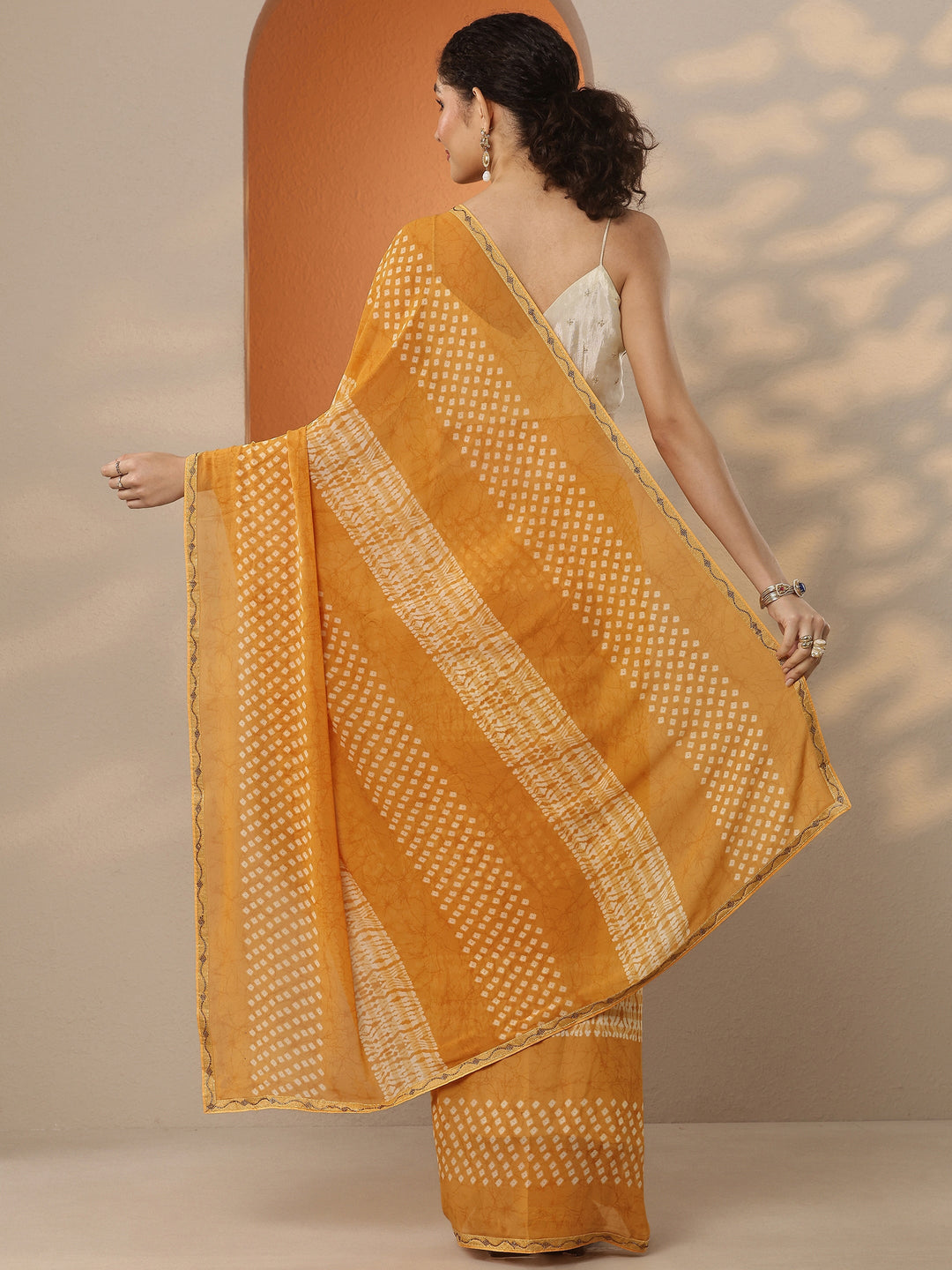 Mustard Bandhani Printed Georgette Saree With Unstitched Blouse Piece