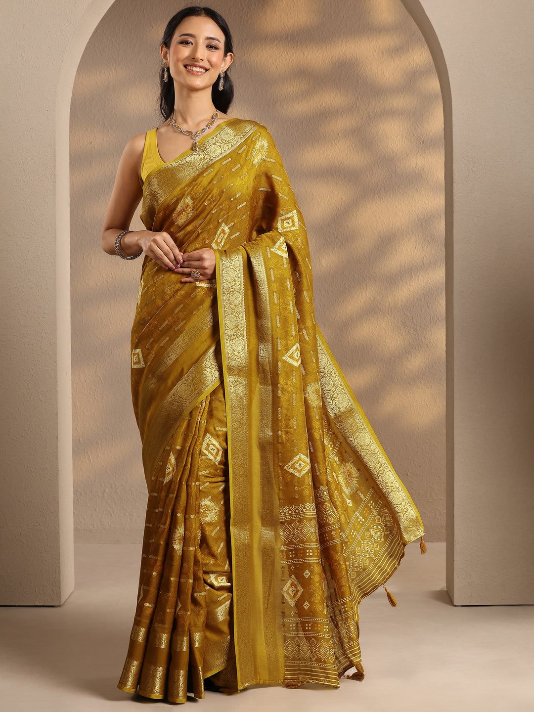 Mustard Woven Design Silk Blend Saree With Unstitched Blouse Piece