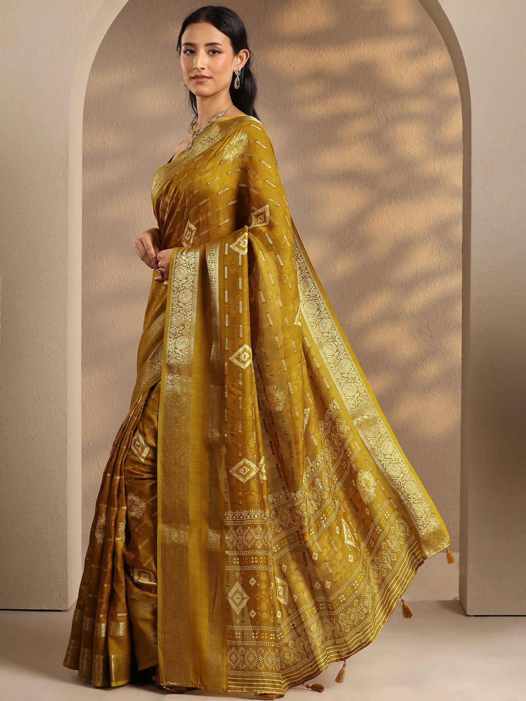 Mustard Woven Design Silk Blend Saree With Unstitched Blouse Piece