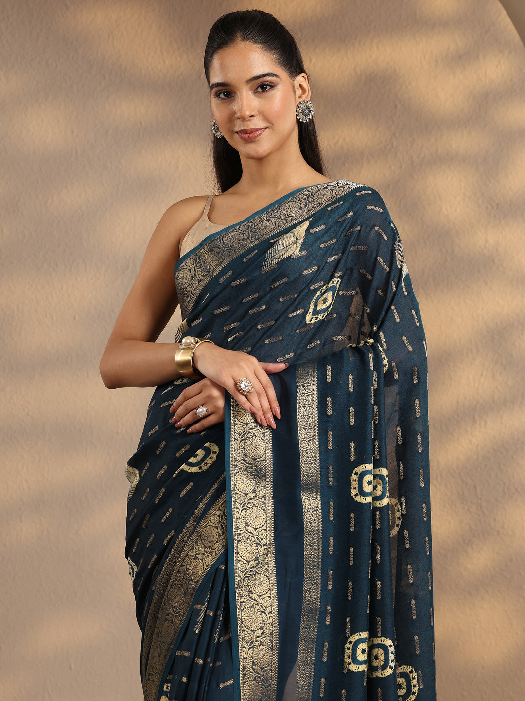 Teal Woven Design Silk Blend Saree With Unstitched Blouse Piece