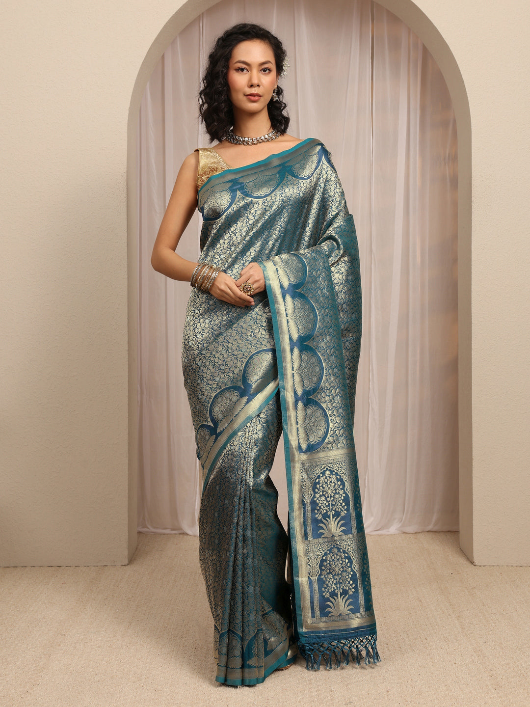 Teal Woven Design Silk Blend Saree With Unstitched Blouse Piece